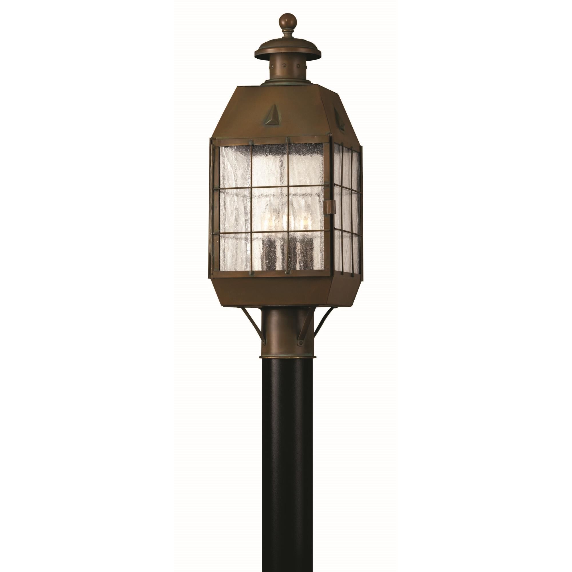 Shown in Aged Brass finish and Clear Seedy Panels glass